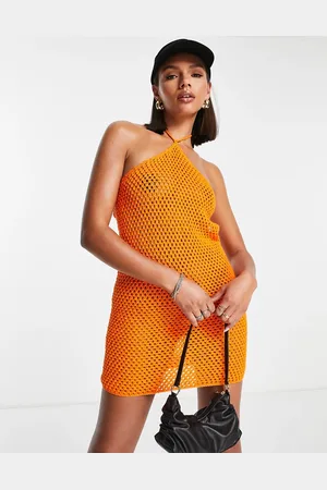 NA-KD X Melissa Bentsen knitted halterneck mini dress in