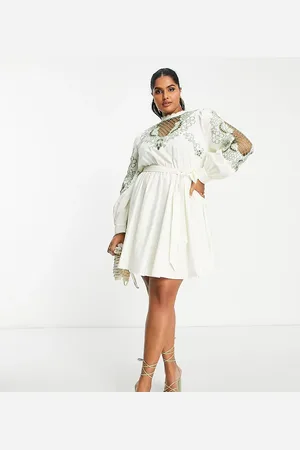 ASOS ASOS DESIGN Curve high neck cutwork belted mini dress in stone with green detail