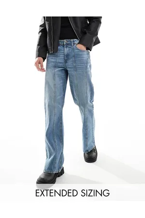 ASOS Wide flare jeans with panelling detail in mid wash