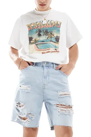 Bershka Ripped denim short in light