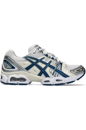 Asics Gel-Nimbus 9 trainers in and light indigo