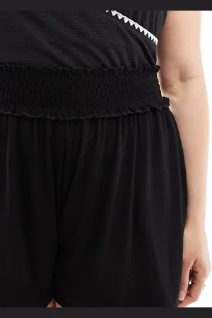 ASOS ASOS DESIGN Curve shirred waist flippy shorts in