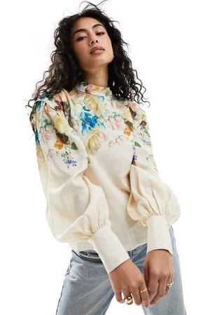 & OTHER STORIES & blouse with volume sleeves in floral placement print