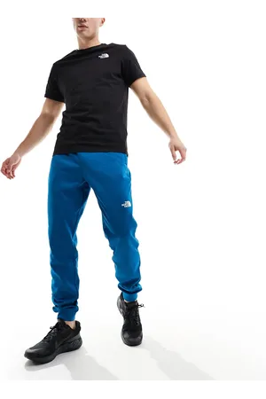 The North Face Training Reaxion logo joggers in heather