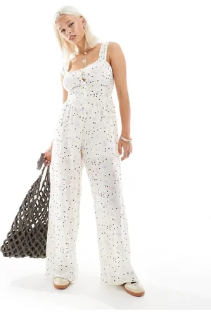 Reclaimed Jumpsuit with buttons in polka dot floral print