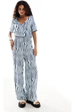 Monki Shirt sleeve jumpsuit with wrap front in wave print