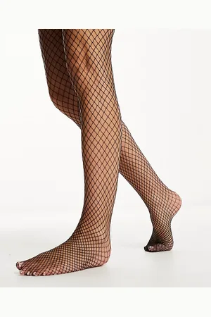 Monki Fishnet tights in black