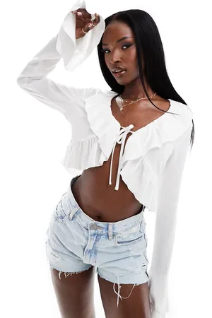 Aria Cove Linen blend ruffle tie detail top in