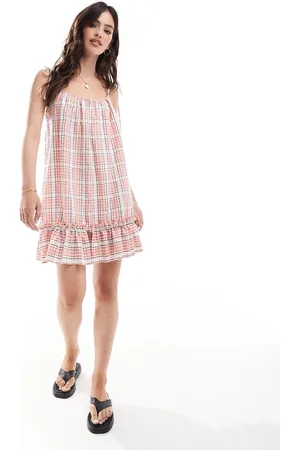 COLLUSION Drop hem mini dress in blush check