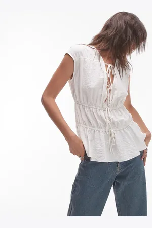 Topshop Sleeveless tie front tiered top in ivory