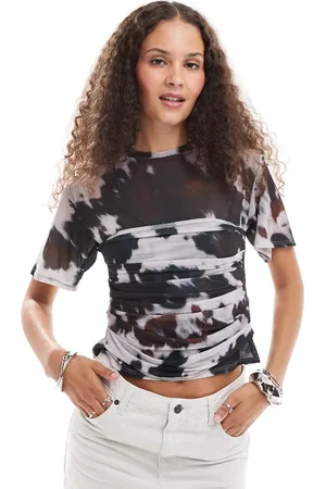 ASOS Sheer mesh short sleeve corset waist top in cow print