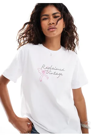 Reclaimed Oversized t-shirt with floral and bow placement print in