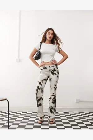 Weekday Low waist straight leg trousers in cow print