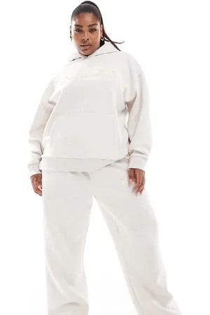 ASOS ASOS DESIGN Curve straight leg jogger co-ord with chenille New Jersey graphic in oatmarl mearl