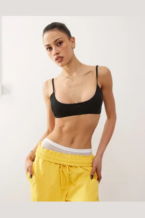 Monki Soft scoop neck pointelle bralette with small bow in washed