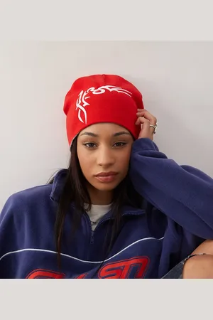 COLLUSION Reversible tattoo print beanie in
