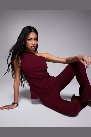 In The Style Bengaline one shoulder ruched asymmetric top co-ord in red