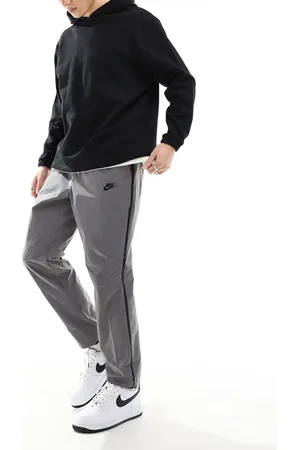 Nike Tech Woven trousers in reflective