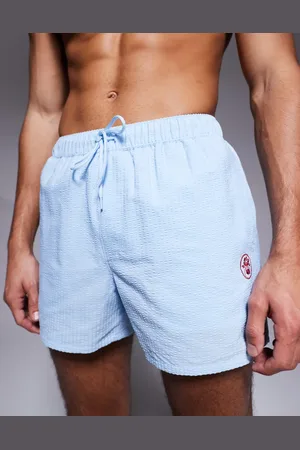 ASOS Seersucker swim shorts in short length with embroidery