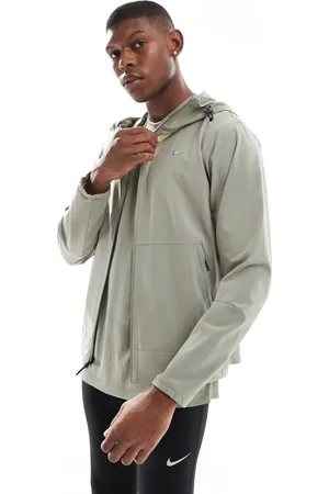 Nike Dri-FIT jacket in light khaki