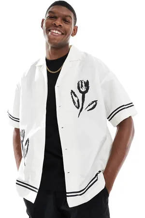 ADPT. Oversized revere collar shirt with flower placement print in