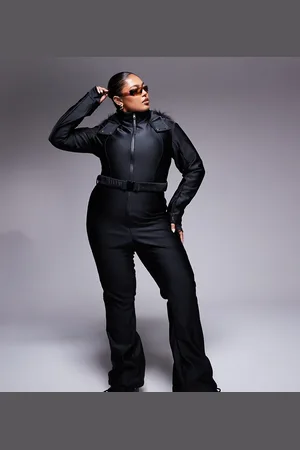 ASOS 4505 Curve Ski belted ski suit with slim kick leg and faux fur hood in gloss