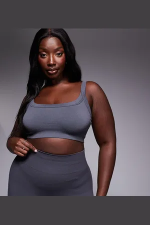ASOS 4505 Curve sculpting seamless medium support sports bra in dark
