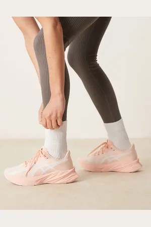 Asics Dynablast 5 running trainers in pink and