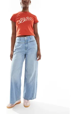ASOS Cropped wide leg jean with front pocket detail in mid