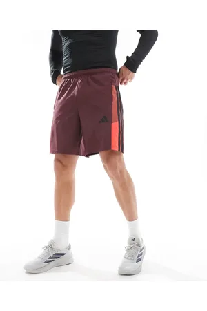 adidas Adidas Training Essentials shorts with 3 stripe in burgundy