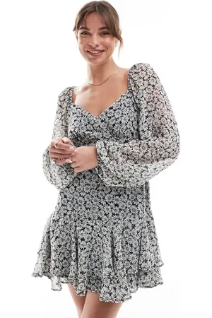 New Look Tiered ruffle mini dress in daisy print