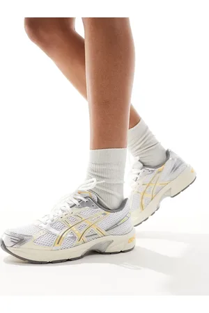 Asics Gel-1130 trainers in and faded yellow