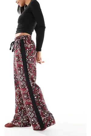 ASOS Pull on trousers with contrast panel in dark cherry bandana print