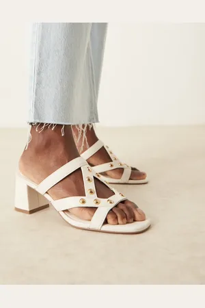 ASOS Howdy stud detail caged mid heeled mules in off