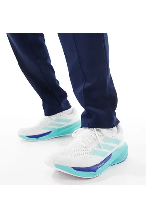 adidas Adidas Running Supernova Stride 2 trainers in and blue