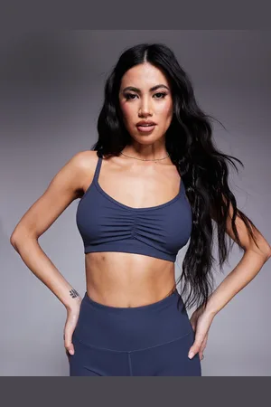 ASOS 4505 soft touch rib light support sports bra with adjustable straps in blue