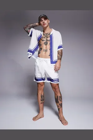 ASOS Co-ord swims shorts in mid length with text graphic in