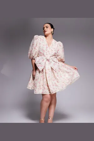 ASOS Curve jacquard puff sleeve mini dress with bow tie in floral print