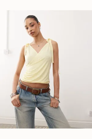 Reclaimed Wrap front tank top with bow shoulder in buttermilk