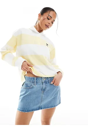 Hollister Low rise mini frayed denim skirt in mid wash