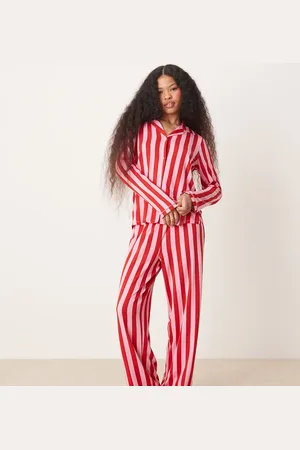 Urban Threads Petite Christmas poly long sleeve revere and trouser pyjama set in pink and red stripe print
