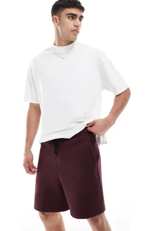 Nike Club tech fleece shorts in burgundy
