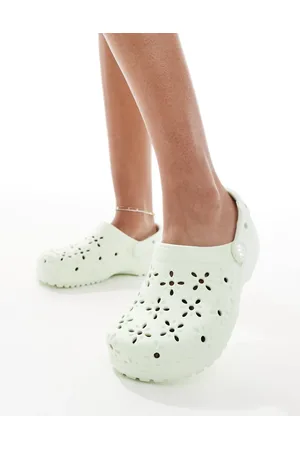 Crocs Classic floral cut out clogs in jade tint