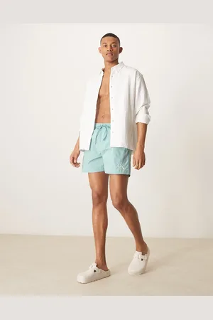 Calvin Klein Drawstring logo swim shorts in aqua