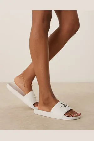 Calvin Klein Monogram sliders in and black