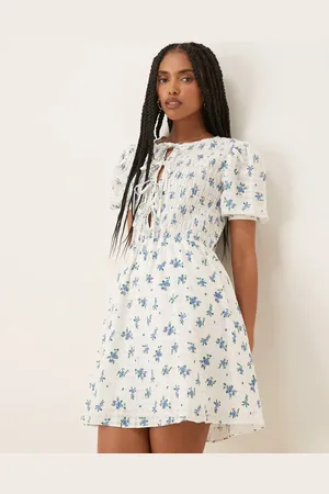 Glamorous Bow detail puff sleeve dress in blue floral