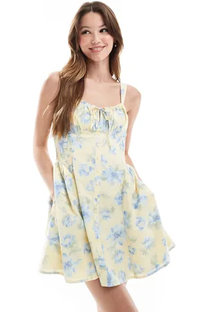 Hollister Milkmaid drop waist button detail sleeveless mini dress in floral print