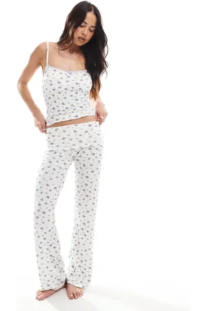 Cotton On Cotton On sleep recovery roll-waist lounge trousers co-ord in lilac ditsy
