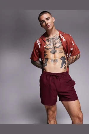 ASOS Swim shorts in short length in burgundy