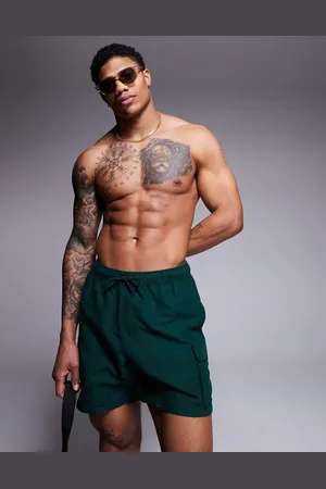 ASOS Swim shorts in mid length with cargo pockets in